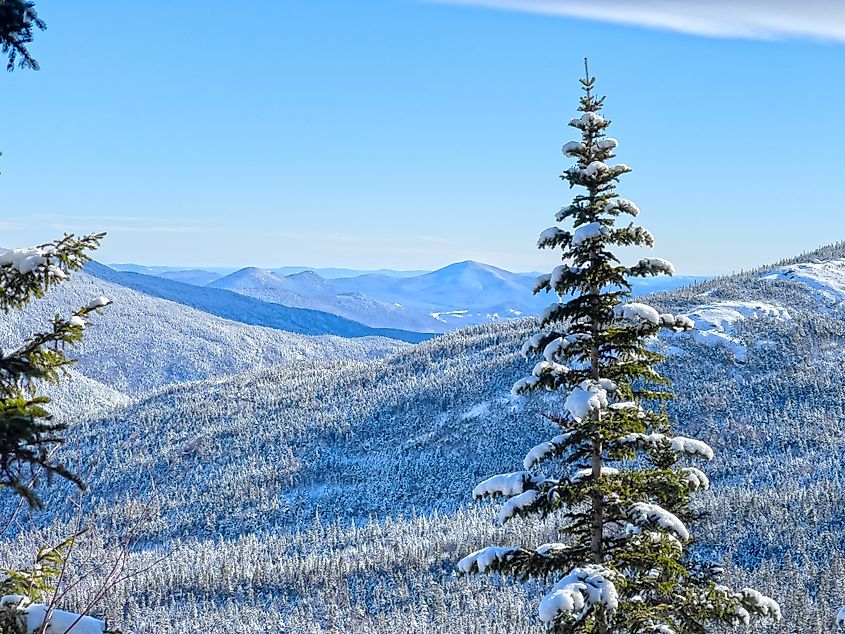 A snowy and winter landscape of the White Mountains of New Hampshire.