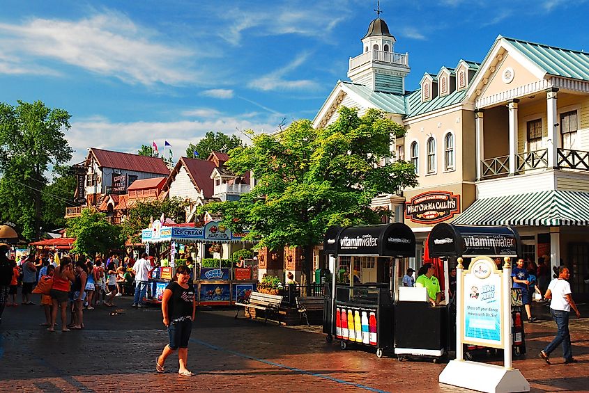 A crowd of people congregate at a recreated New England village in Agawam, Massachusetts.