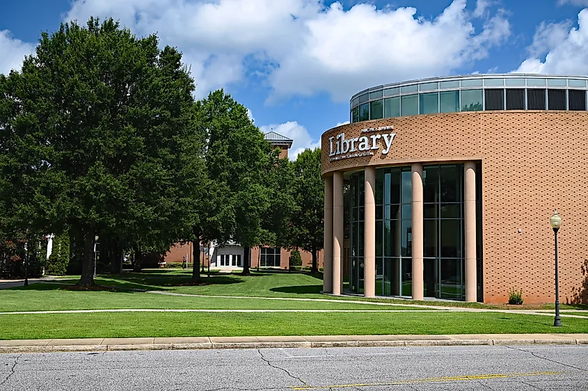 Hughes Main Library at Heritage Green in Greenville, South Carolina, a large modern building with glass and brick exterior