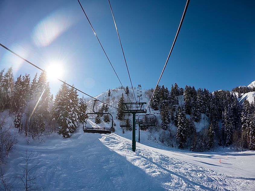 view from a ski lift at Sundance Ski Resort on a beautiful sunny winter day in Utah.