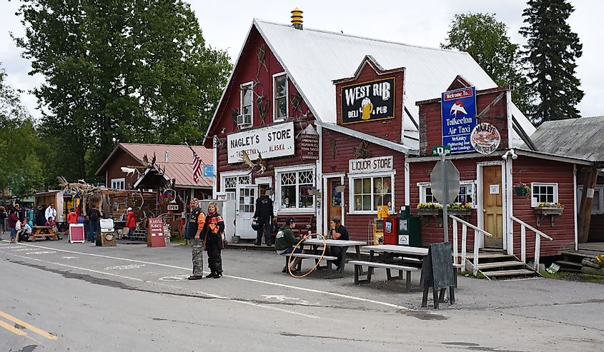 Facade of stores and pubs in the small old town of Talkeetna