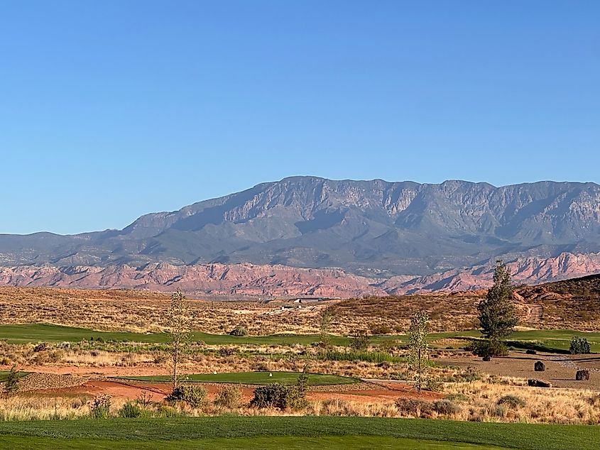 Clear blue sky over rugged mountains surrounding Mesquite, Nevada.
