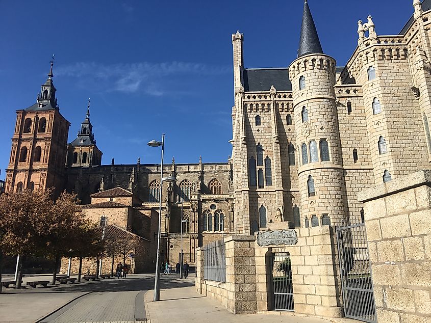 The ostentatious Episcopal Palace designed by famous Catalan architect,  Antoni Gaudí. To its left, Santa María Cathedral  