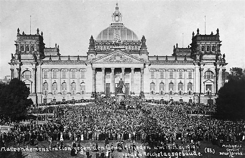 "Demonstrations against the Treaty of Versailles, takes place in front of the Reichstag building."