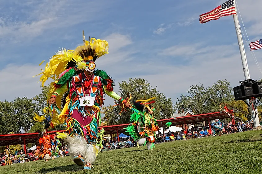 Editorial Photo Credit: Pierre Jean Durieu via Shutterstock. BISMARK, NORTH DAKOTA, September 8, 2018 : A dancer of the 49th annual United Tribes Pow Wow, a large outdoor event that gathers more than 900 dancers and musicians celebrating native american culture