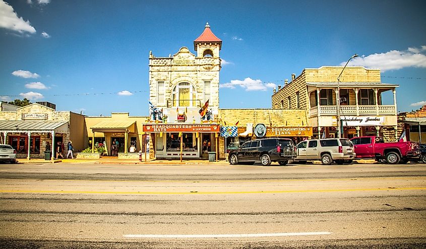 The Main Street in Frederiksburg, Texas, also known as "The Magic Mile", with retail stores and poeple walking