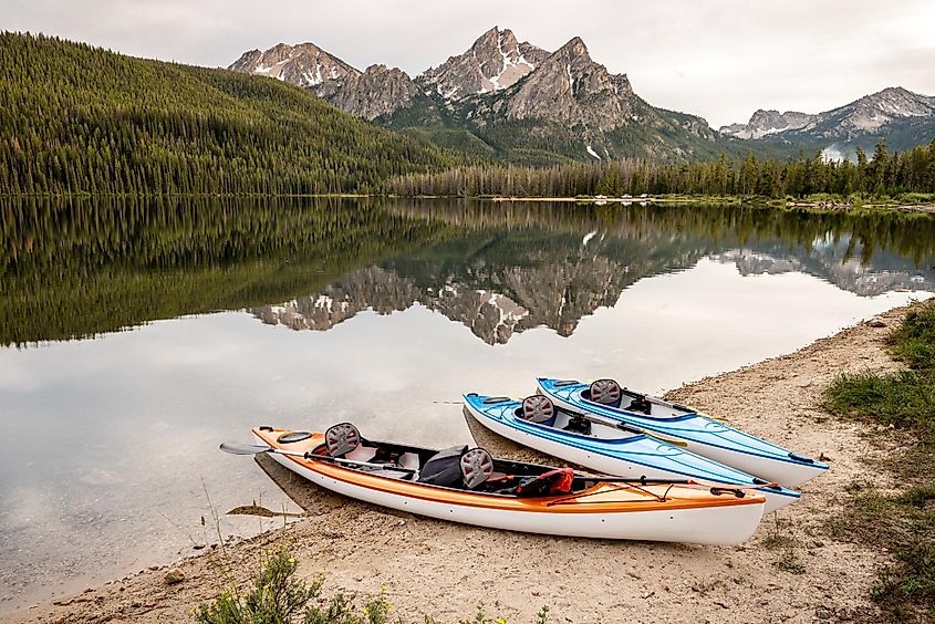 Kayaks along the shore with the beautiful Sawtooth Lake in Stanley, Idaho.