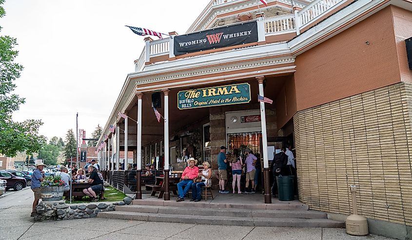 People gather outside the famous Irma Restaurant and Grill in the downtown area