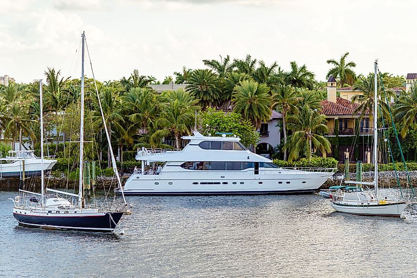 Yachts moored on canal at sunset in Fort Lauderdale.