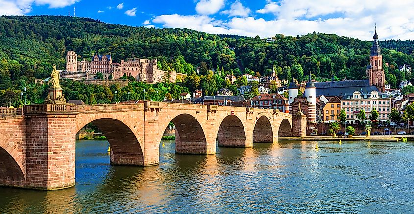 The ruined Heidelberg Castle on the slopes above the Old Bridge and the city below.