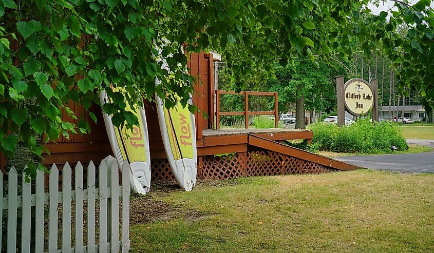 Surf boards and white picket fence in Stanton, Michigan