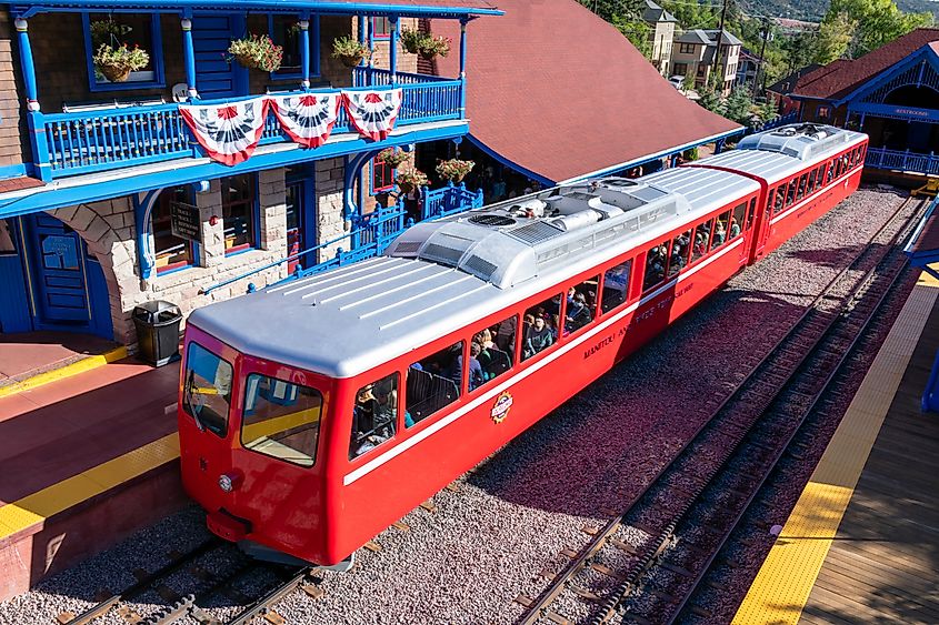 The Broadmoor Manitou and Pikes Peak Cog Railway train is ready for departure from train station.