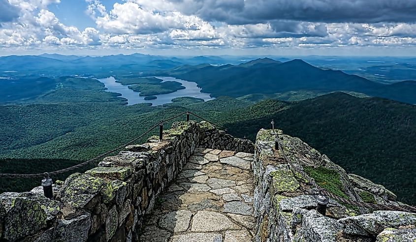 The view from the stone path on Whiteface Mountain looking over Lake Placid and the Adirondack Mountains.