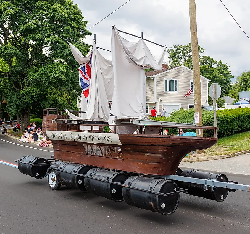 A mock HMS Gaspee float being towed during 2023 Gaspee Days parade, Pawtuxet Village, Rhode Island.