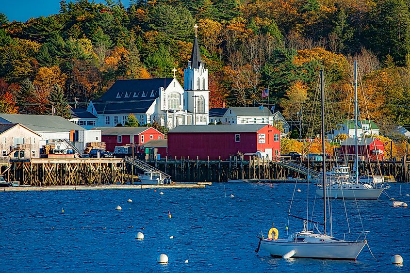 Our Lady Queen of Peace catholic church on the shore of Boothbay harbor, Maine, via Bob Pool / Shutterstock.com