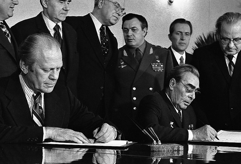 Gerald Ford and Leonid Brezhnev signing a joint communiqué on the SALT I treaty during the Vladivostok Summit in 1974
