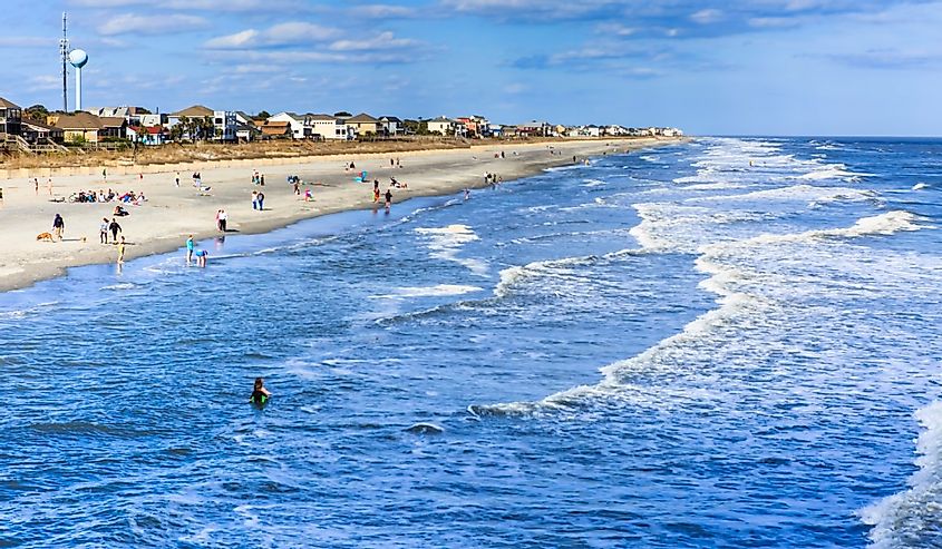 Residents and tourists flock to the Atlantic Ocean at Folly Beach, also known as the "edge of America," near Charleston in South Carolina.
