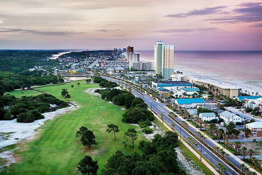 View of Front Beach Road at sunrise in Panama City Beach, Florida.