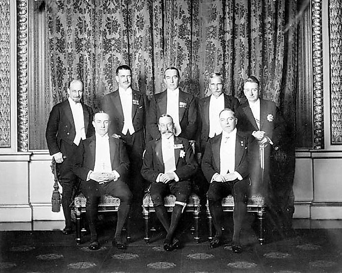 1926 Imperial Conference: George V and the prime ministers of the Empire. Clockwise from centre front: George V, Baldwin (United Kingdom), Monroe (Newfoundland), Coates (New Zealand), Bruce (Australia), Hertzog (South Africa), Cosgrave (Irish Free State), King (Canada).