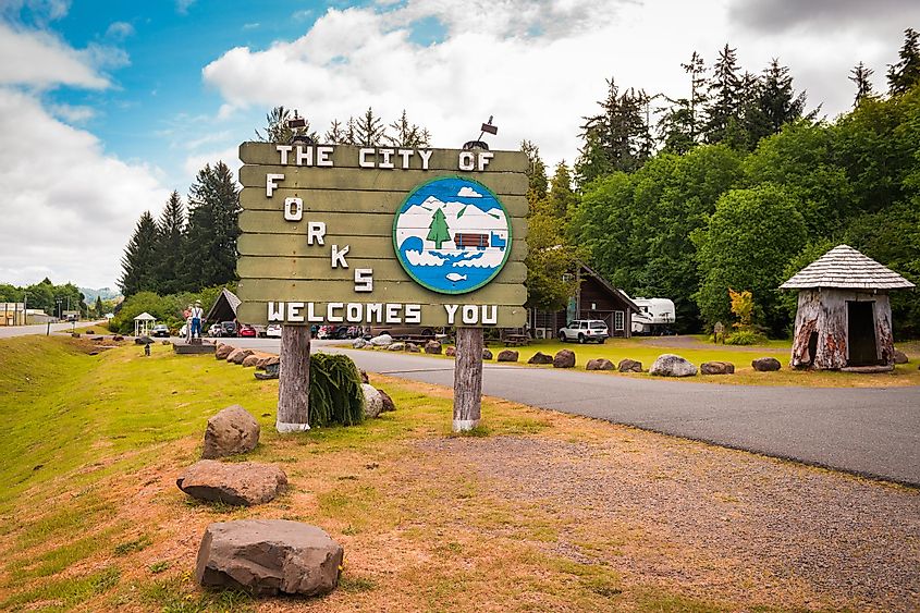 Welcome sign reading: "The City of Forks Welcomes You", via Sean Pavone / Shutterstock.com
