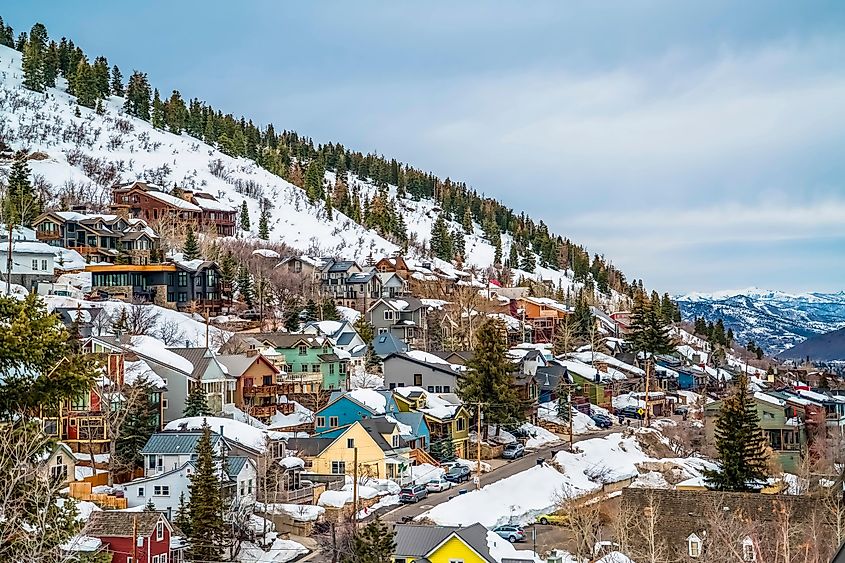 Colorful cabins on a mountain with snow during winter season in Park City Utah.