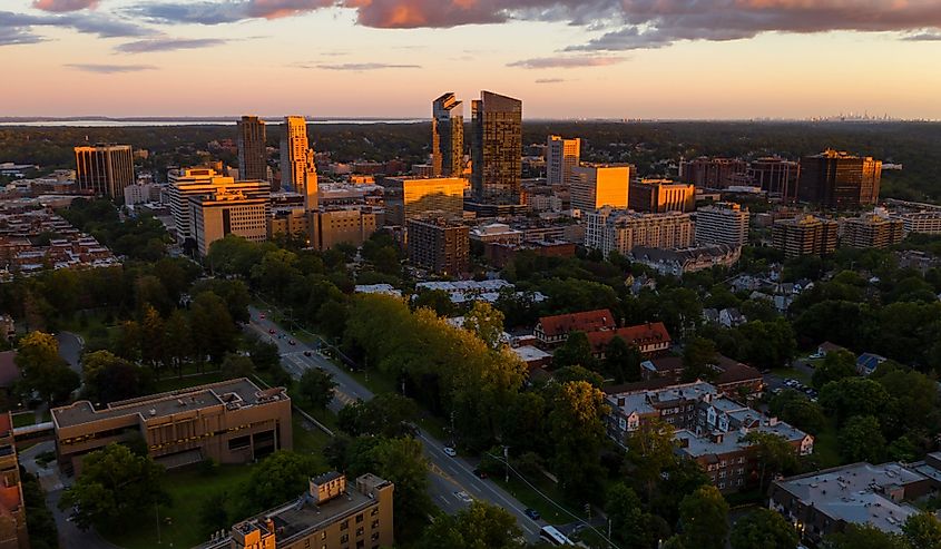 An aerial view of White Plains New York at sunset look up on the horizon for Manhattan