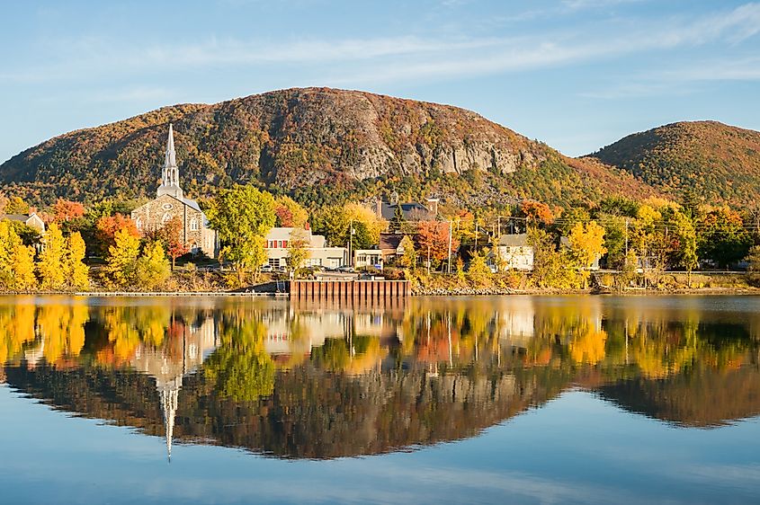 Mont Saint-Hilaire in Fall from Richelieu river banks in Beloeil.