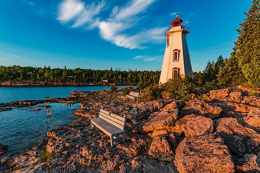 Peaceful Morning Light at Big Tub Lighthouse in Tobermory Ontario Canada. Credit: Facto Photo/Shutterstock.com