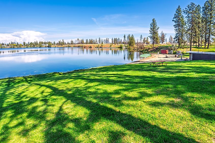The lakefront beach and play area at Medical Lake Waterfront Park in the rural Spokane County town of Medical Lake, Washington State.