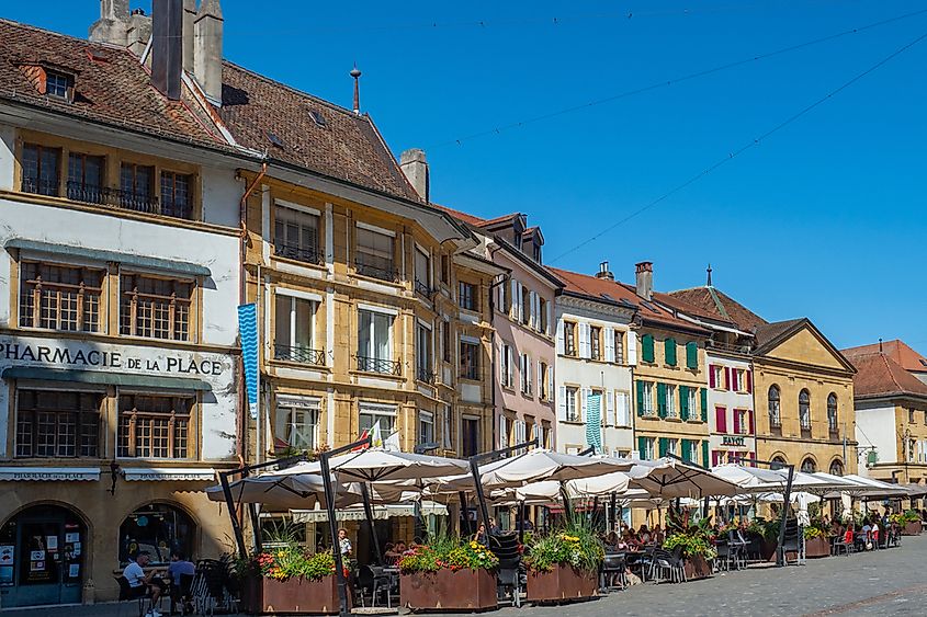 Colorful facades and restaurants in the lively historic city centre of Yverdon-les-Bains