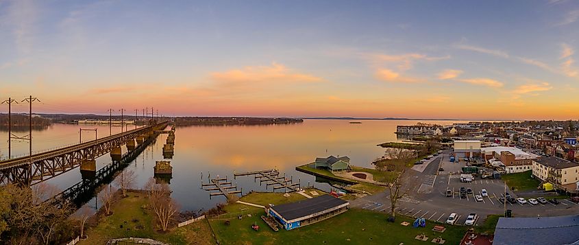 Havre De Grace, Maryland: Aerial sunset panorama showcasing the railroad bridge over the mouth of the Susquehanna River and the head of Chesapeake Bay.