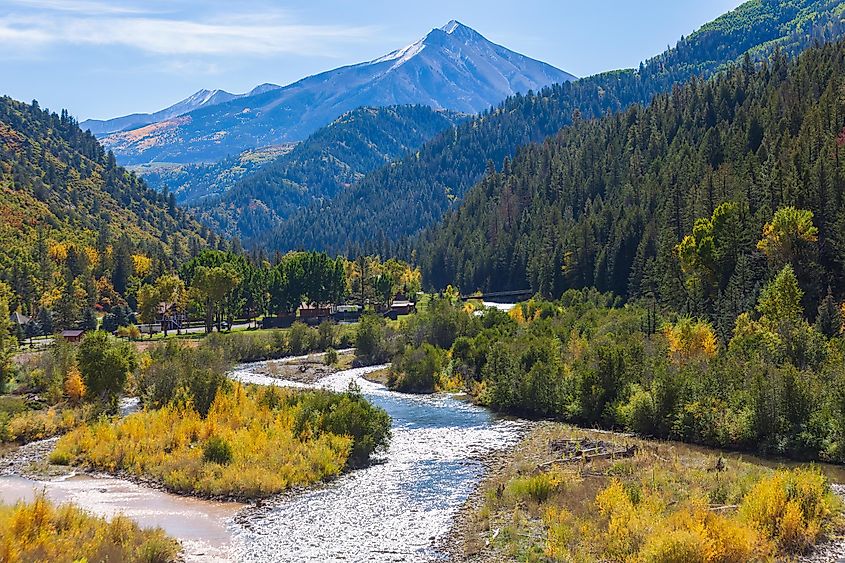 River flowing out of a mountain valley near Paonia, Colorado in autumn