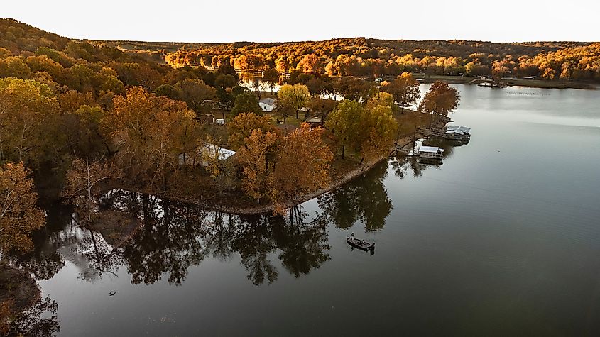 Grand Lake bordered by fall foliage.