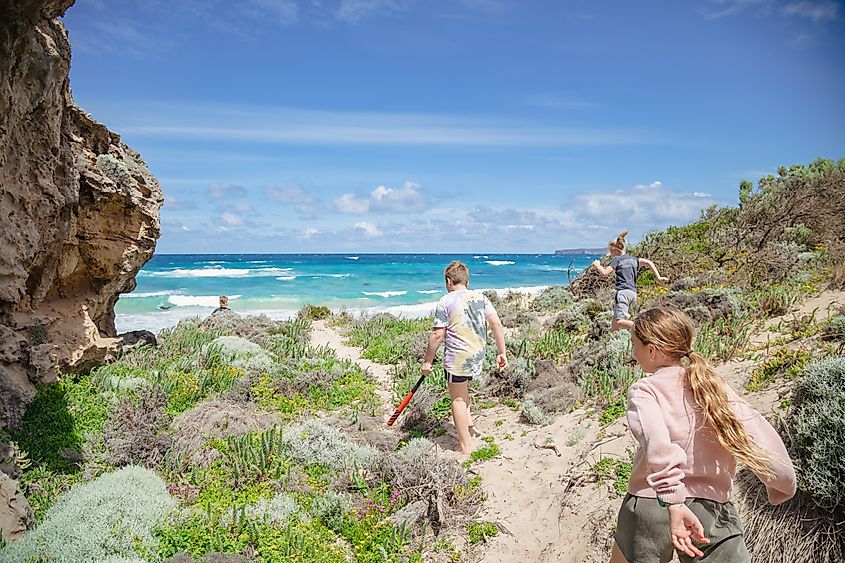 Kids on a beach adventure at Murrel's Beach near Portland in Victoria, Australia