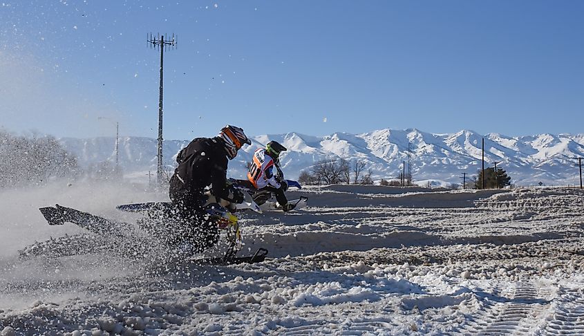 People snowbiking in Morgan, Utah.