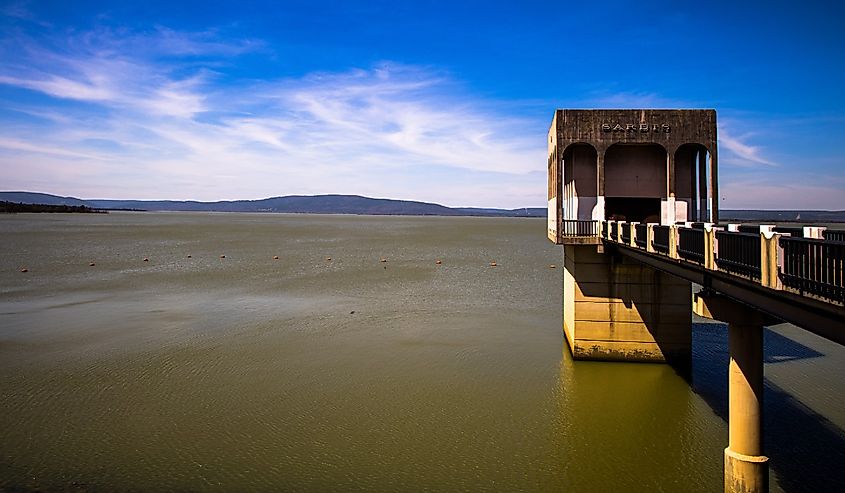Closeup of a Sardis Lake dam with cloudy sky in the background, Oklahoma, United States