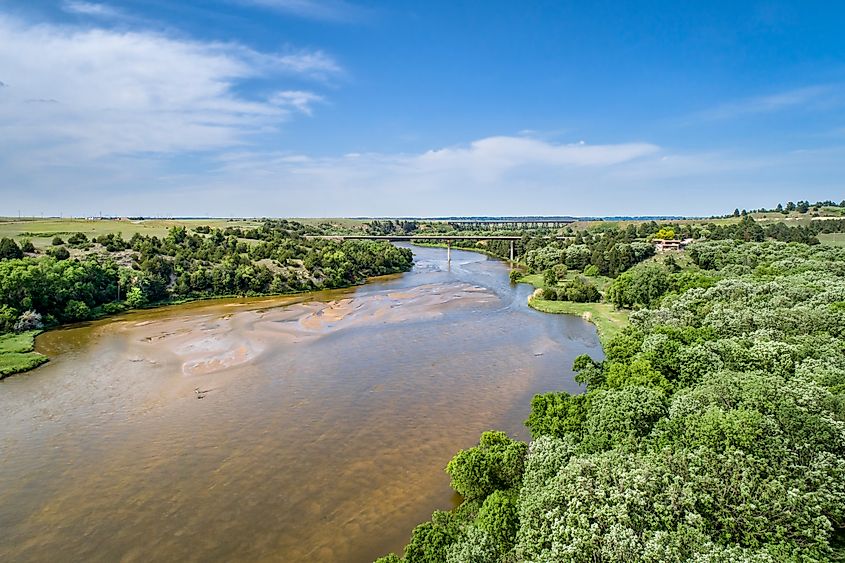 The Niobrara River surrounded by thick forests near Valentine, Nebraska.