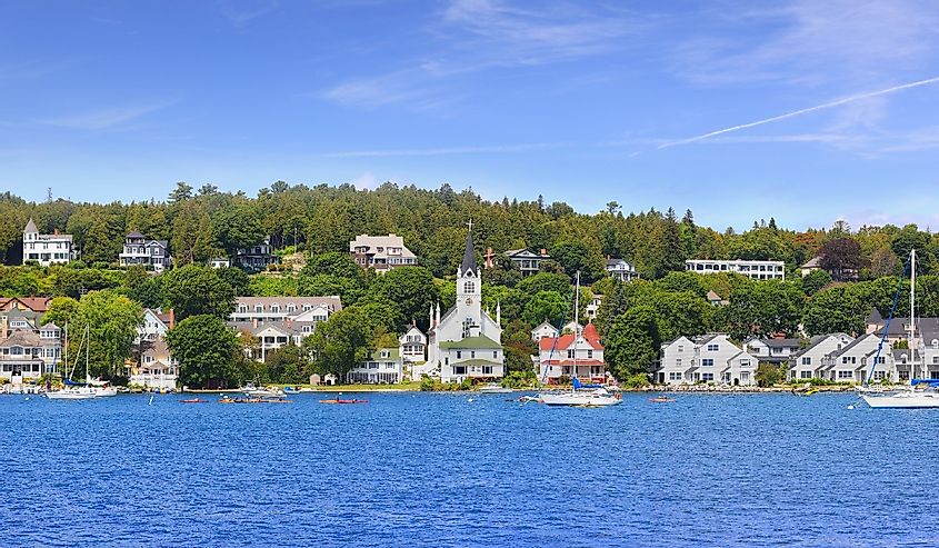 Homes along the water and the church in Mackinac Island