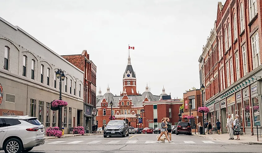 Red brick city hall with a clock tower in the scenic historic center in Stratford, Ontario.