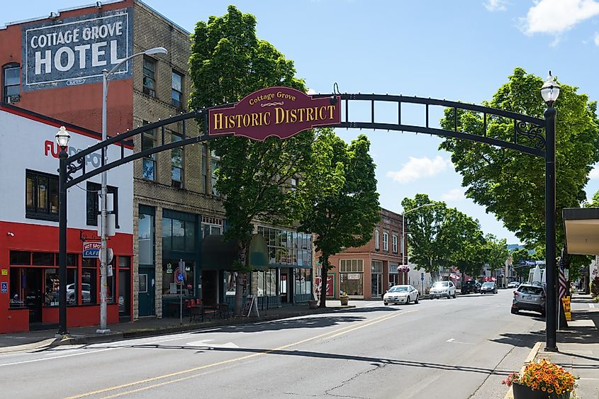 Arched sign across East Main Street in Cottage Grove Historic District, Oregon, USA.