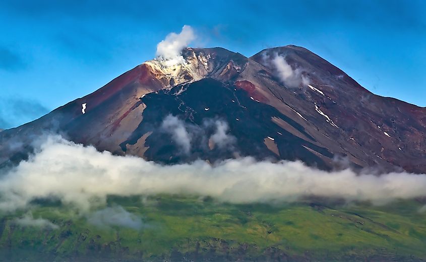 A volcano rising over the Aleutian Islands, Alaska.