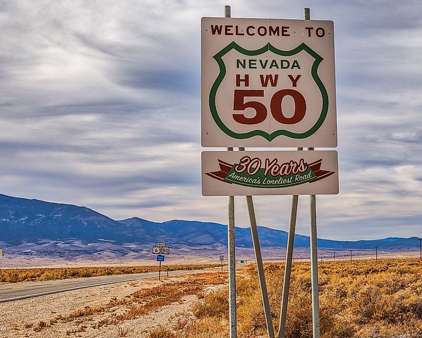 Sign near the Nevada-Utah state line celebrating 30 years of being designated the Loneliest Road in America
