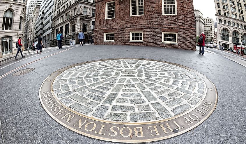 The Site of The Boston Massacre in front of the Old Massachusetts State House with locals and tourists passing by on October 16, 2013 in Boston