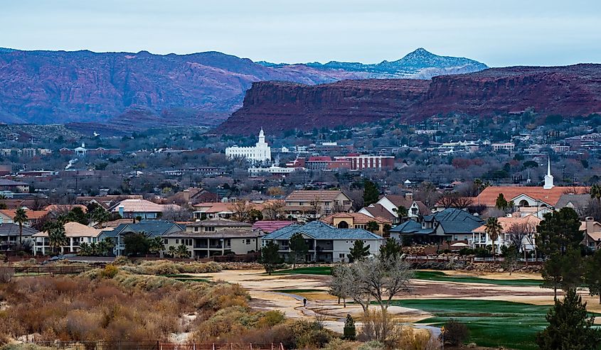 White temple and red rock mountains in St. George, Utah