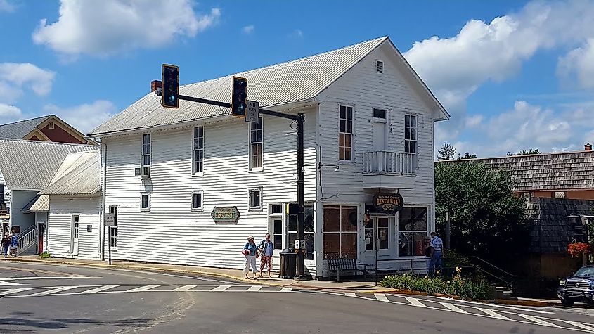 F.P. Taggart Store in Nashville, Indiana, a historic brick building with arched windows and a central entrance along a quaint downtown street