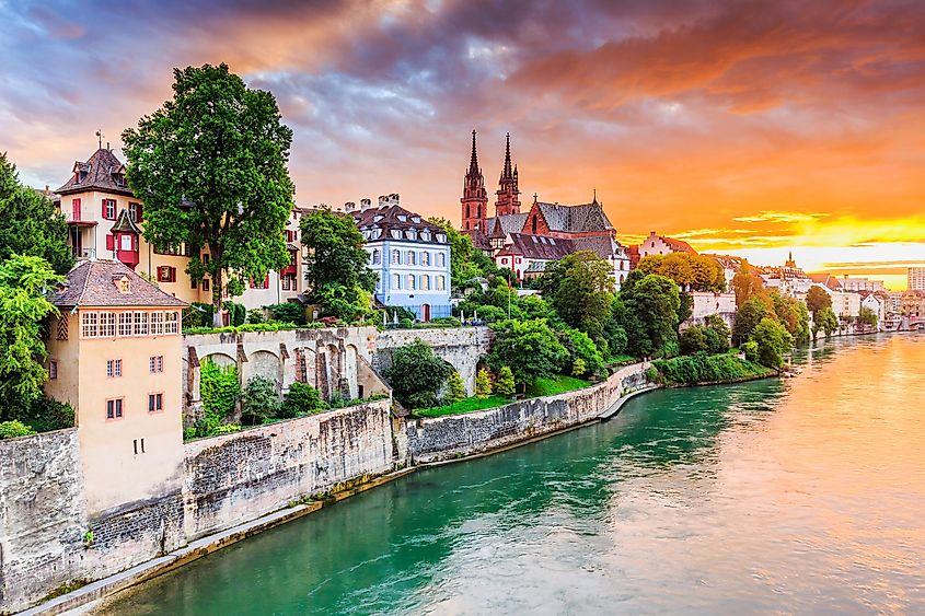 Basel, Switzerland. Old town with red stone Munster cathedral on the Rhine river.