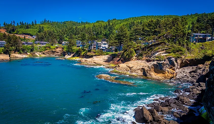 Aerial shot of Depoe Bay in Orgeon and its crystal blue waters