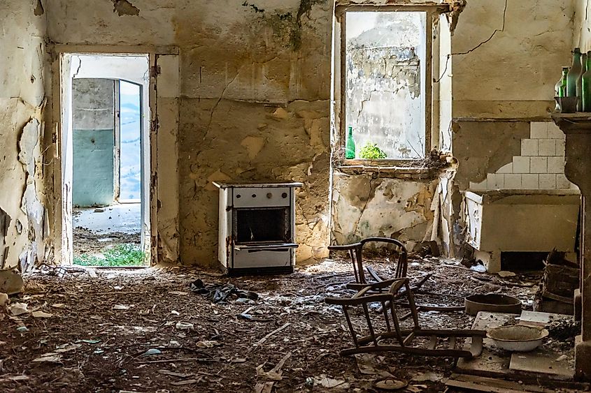 Interior of an abandoned house in Craco, a ghost town in the province of Matera abandoned due to a landslide, Italy