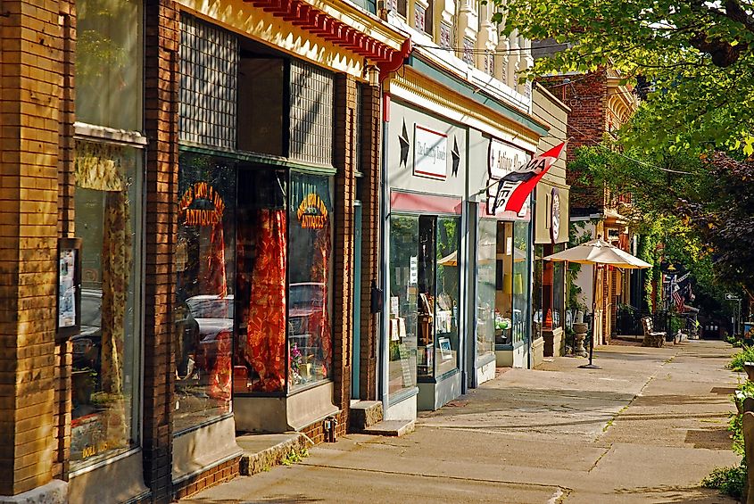 Boutiques and independent stores populate the charming historic downtown Cold Spring, New York, via James Kirkikis / Shutterstock.com