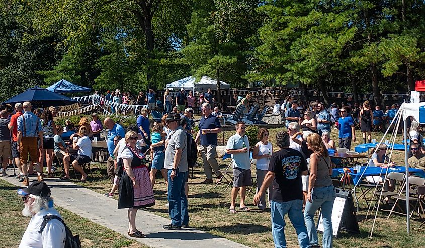 People enjoying open air (outdoor party) Oktoberfest.